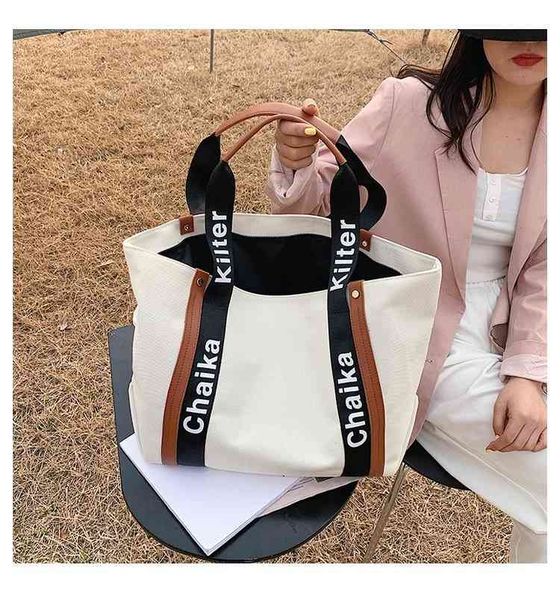 new large capacity canvas handbag letter bag shoulder women's fashion brand popular ladies s luxury s
new large capacity canvas handbag letter bag shoulder women's fashion brand popular ladies s luxury s