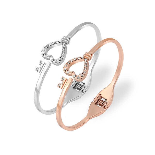 titanium steel love bracelet peach heart key spring open two colors, Black
titanium steel love bracelet peach heart key spring open two colors, Black