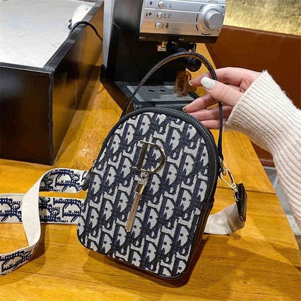 three-tier mobile phone versatile one messenger round on small hand women's trend clearance outlet sale
three-tier mobile phone versatile one messenger round on small hand women's trend clearance outlet sale