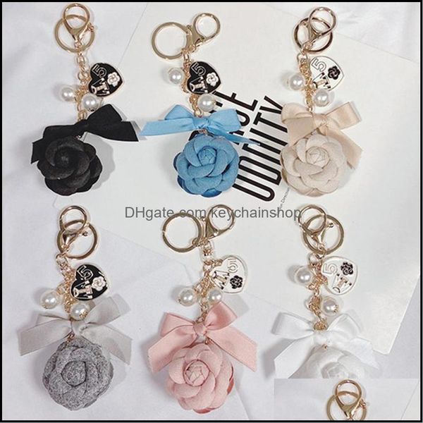 key rings jewelry double-sided camellia keychain flower ring chains women love heart pendant keyring imitation pearl car k dh3to, Slivery;golden
key rings jewelry double-sided camellia keychain flower ring chains women love heart pendant keyring imitation pearl car k dh3to, Slivery;golden