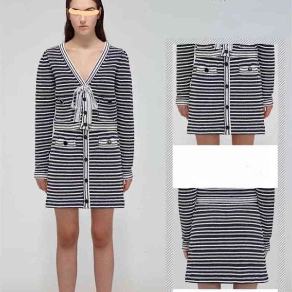 two piece dress high end french temperament spring and summer blue white stripes contrast lace up short suit skirt knitted cardigan
two piece dress high end french temperament spring and summer blue white stripes contrast lace up short suit skirt knitted cardigan