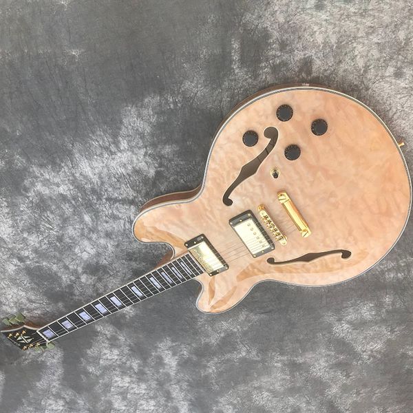 chinese electric guitar 335 hollow body natrual color flame maple gold hardware
chinese electric guitar 335 hollow body natrual color flame maple gold hardware