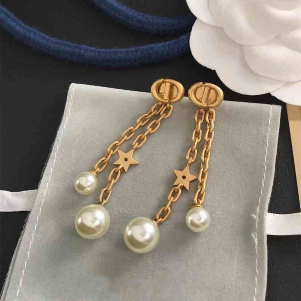 letter chain tassel size pearl earrings female star earrings us design jewelry, Golden
letter chain tassel size pearl earrings female star earrings us design jewelry, Golden