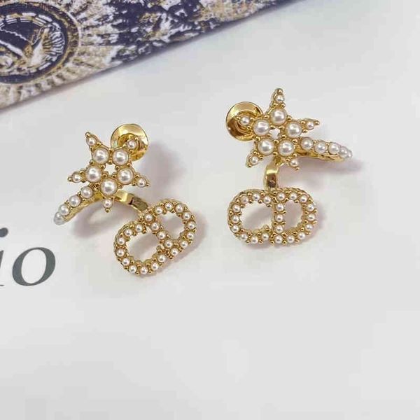 2022 factory wholesale new di home high version surround stars pearl women's hollow out simple earrings qm21, Golden
2022 factory wholesale new di home high version surround stars pearl women's hollow out simple earrings qm21, Golden