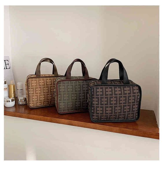 bags sale purses fog flower new version simple letter portable cosmetic wash work commuter mommy bagdesigner women's bag
bags sale purses fog flower new version simple letter portable cosmetic wash work commuter mommy bagdesigner women's bag
