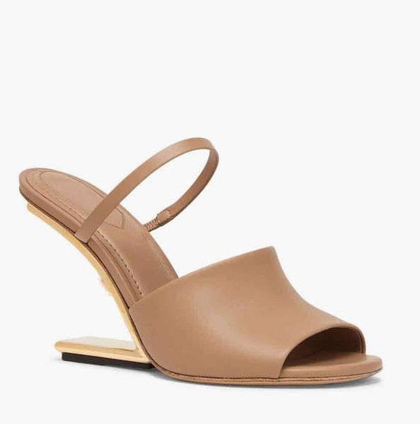 first black leather high-heeled sandals with wide band and strap. made of leather diagonal f-shaped sculpted heel in gold-coloured metal box
first black leather high-heeled sandals with wide band and strap. made of leather diagonal f-shaped sculpted heel in gold-coloured metal box