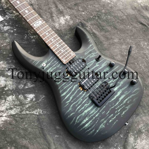 jpx ernie ball john petrucci matte green flame maple electric guitar double locking tremolo bridge, black hardware, whammy bar
jpx ernie ball john petrucci matte green flame maple electric guitar double locking tremolo bridge, black hardware, whammy bar