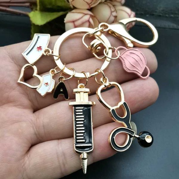 keychains new dripping oil keychain doctor medical tool stethoscope syringe mask key ring nurse student gift 26 letters, Silver
keychains new dripping oil keychain doctor medical tool stethoscope syringe mask key ring nurse student gift 26 letters, Silver