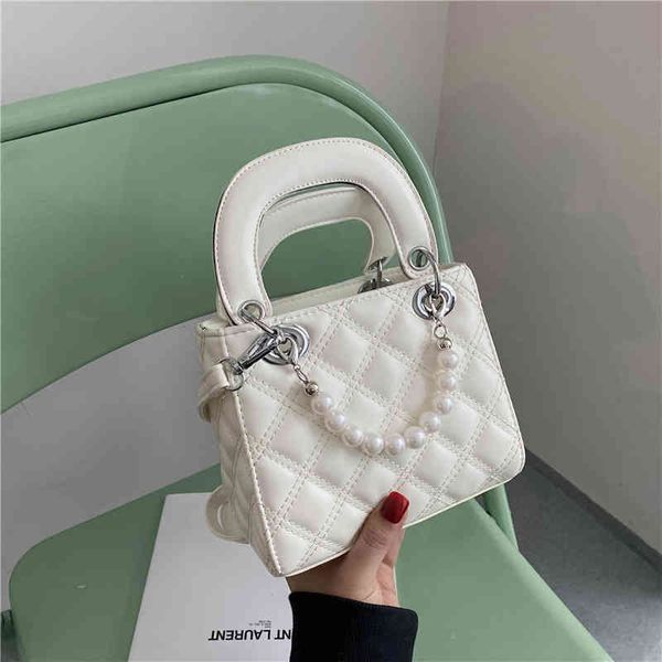 style women's spring summer new small shoulder texture msenger bag handbag 2022 brand luxury fashion design ladies handbags 
style women's spring summer new small shoulder texture msenger bag handbag 2022 brand luxury fashion design ladies handbags
