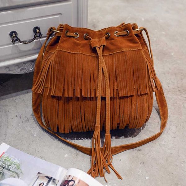 simple tassel new drawstring bucket tassel bag single shoulder messenger bag handbag
simple tassel new drawstring bucket tassel bag single shoulder messenger bag handbag