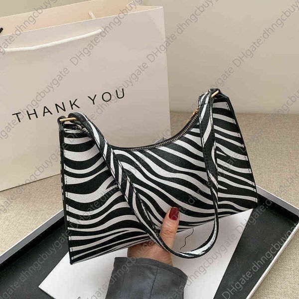 designer bags handbags /bagsbagsfashion zebra print women luxury handbag pu leather simple underarm shoulder female daily design totes purse
designer bags handbags /bagsbagsfashion zebra print women luxury handbag pu leather simple underarm shoulder female daily design totes purse