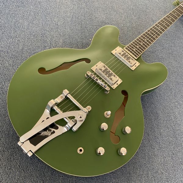 jazz hollow body electric guitar, ebony fingerboard, 2 f holes,matte finish tremolo system
jazz hollow body electric guitar, ebony fingerboard, 2 f holes,matte finish tremolo system