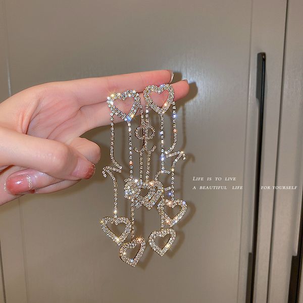 925 silver stud rhinestone-encrusted love heart stud earrings long pendant korean trendy personality fashion exquisite design sense eardrop, Golden
925 silver stud rhinestone-encrusted love heart stud earrings long pendant korean trendy personality fashion exquisite design sense eardrop, Golden