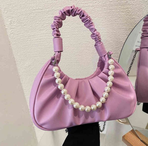design bag 2022 trendy baguette bags versatile pearl chain portable single messenger rivet semicircle fashion female shoulder handbags
design bag 2022 trendy baguette bags versatile pearl chain portable single messenger rivet semicircle fashion female shoulder handbags
