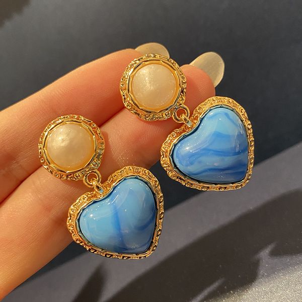 women's blue turquoise love pendant earrings temperament fashion luminous stone earrings accessories, Golden;silver
women's blue turquoise love pendant earrings temperament fashion luminous stone earrings accessories, Golden;silver