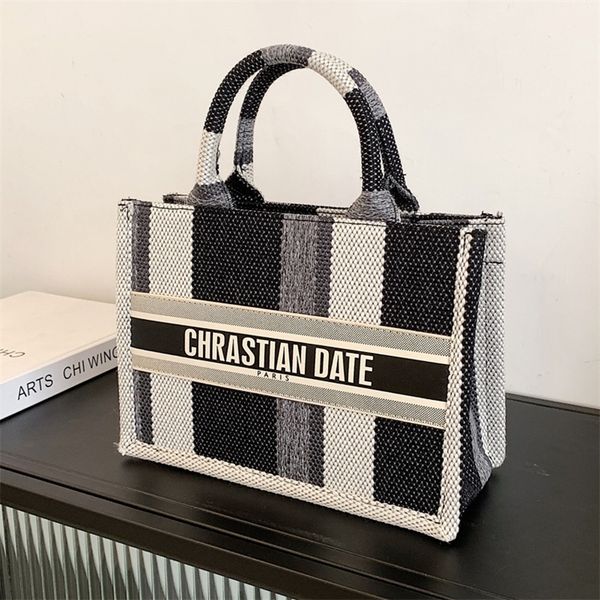 new fashion canvas large capacity striped portable bag simple trend women's tote bag purses onlines
new fashion canvas large capacity striped portable bag simple trend women's tote bag purses onlines