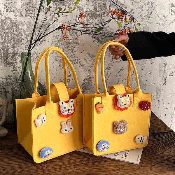 shopping bags cartoon felt bag female hand baby full moon one year old packaging box with hand gift children's fashion and leisure 2204
shopping bags cartoon felt bag female hand baby full moon one year old packaging box with hand gift children's fashion and leisure 2204