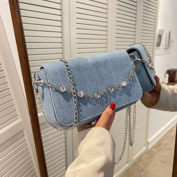 cc new denim bag women's small fragrance chain hand fashion versatile one shoulder messenger bag canvas underarm
cc new denim bag women's small fragrance chain hand fashion versatile one shoulder messenger bag canvas underarm