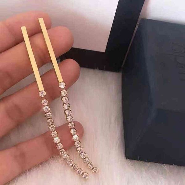 new versatile red the temperament tassel with diamond earrings high version 925 silver needle earrings, Golden
new versatile red the temperament tassel with diamond earrings high version 925 silver needle earrings, Golden