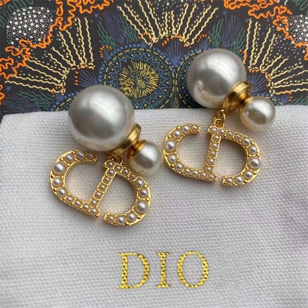 70% off clearance sale new classic style inlaid pearl earrings, female star's same front and rear asymmetric earrings, Golden
70% off clearance sale new classic style inlaid pearl earrings, female star's same front and rear asymmetric earrings, Golden