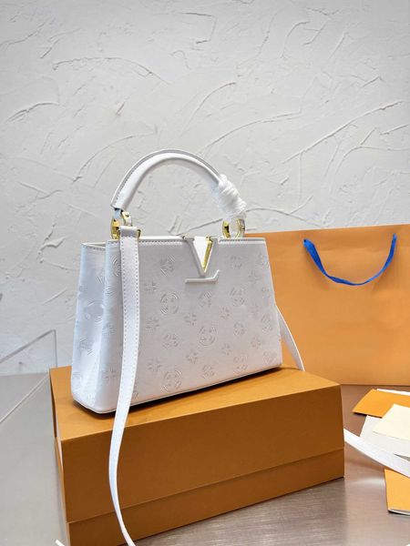 tz women capucines lady's bag cowhide material queen's fan handbag classic big logo design and small flower elements simple and at
tz women capucines lady's bag cowhide material queen's fan handbag classic big logo design and small flower elements simple and at