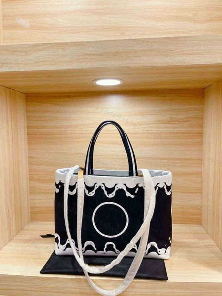 2021 women's spring and summer navy blue striped beach bag portable shopping size 35*25cm
2021 women's spring and summer navy blue striped beach bag portable shopping size 35*25cm