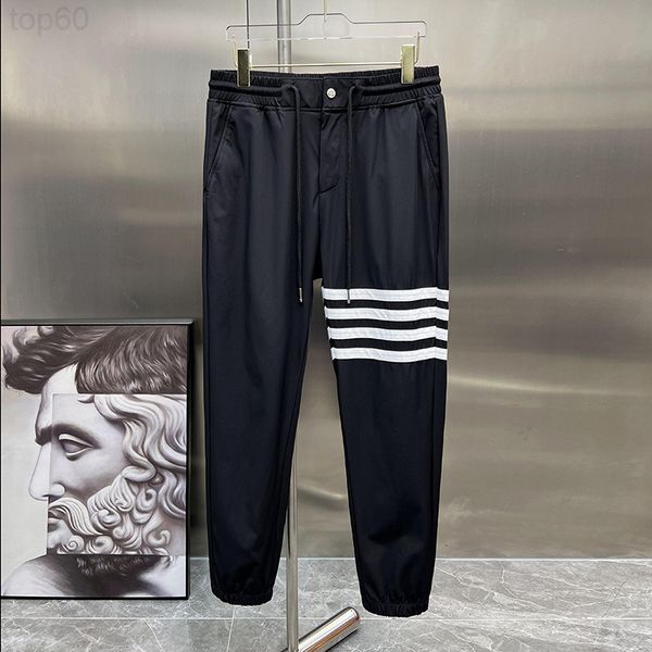men's pants designer tb thin casual pants 2022 summer new classic four bar webbing elastic band drawcord versatile leggings men's, Black
men's pants designer tb thin casual pants 2022 summer new classic four bar webbing elastic band drawcord versatile leggings men's, Black