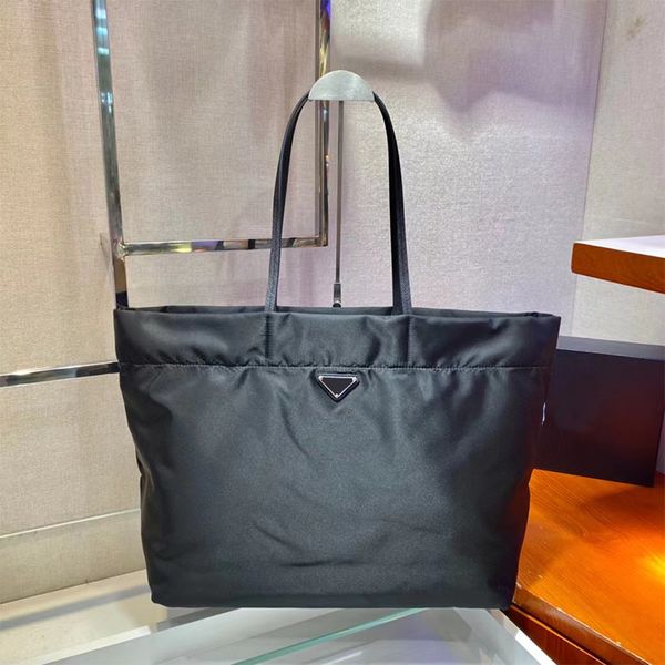 luxury handbag tote designer 2005 classic nylon practical large capacity tote bag star with the same small triangle decoration 40cm
luxury handbag tote designer 2005 classic nylon practical large capacity tote bag star with the same small triangle decoration 40cm