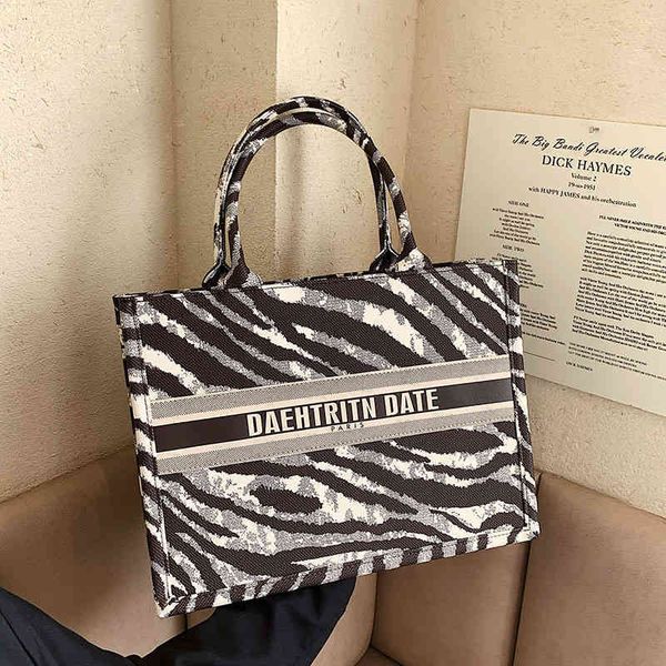 this year's popular online red versatile high-capacity foreign fashion pattern portable bag
this year's popular online red versatile high-capacity foreign fashion pattern portable bag