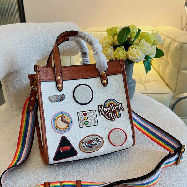 hh luxurious designer women badge totes shopping bag fashion rainbow shoulder straps high capacity letter coac handbag commuting practical b
hh luxurious designer women badge totes shopping bag fashion rainbow shoulder straps high capacity letter coac handbag commuting practical b
