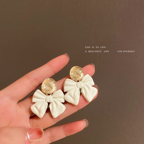 925 silver stud bow korean sweet girl earrings summer simplicity fresh all-matching personalized eardrop, Golden
925 silver stud bow korean sweet girl earrings summer simplicity fresh all-matching personalized eardrop, Golden