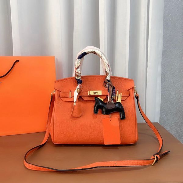 designer tote bags classic brown grain leather large capacity crossbody bags with silk scarf pony charm full shoulder bag1
designer tote bags classic brown grain leather large capacity crossbody bags with silk scarf pony charm full shoulder bag1
