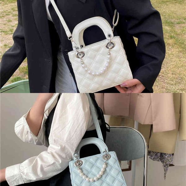 new fashion hand-held women's style bag versatile high-grade texture one shoulder small square bag
new fashion hand-held women's style bag versatile high-grade texture one shoulder small square bag