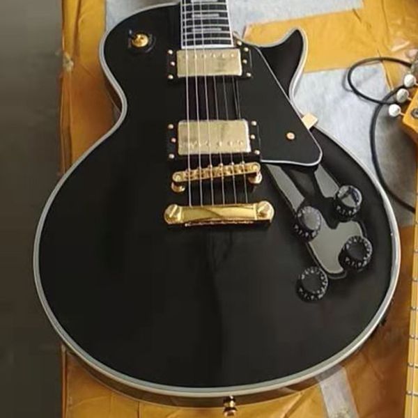 customized black gloss electric guitar with ebony fretboard and fret binding
customized black gloss electric guitar with ebony fretboard and fret binding
