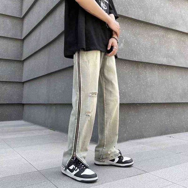 summer ripped blue jeans men slim fashion zipper casual straight jeans men streetwear hip hop hole denim pants mens trousers t220727
summer ripped blue jeans men slim fashion zipper casual straight jeans men streetwear hip hop hole denim pants mens trousers t220727