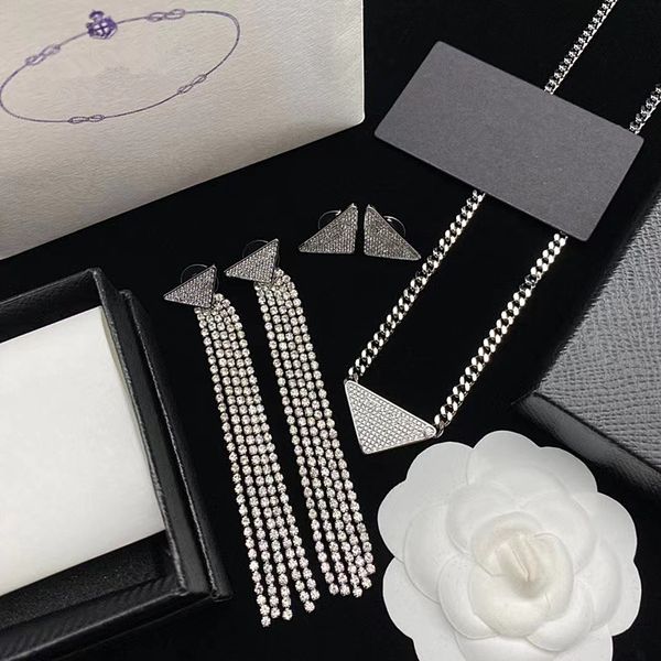 pra european american street fashion inverted triangle letter dangles pendant earrings men and women necklace cold wind silver ear studs
pra european american street fashion inverted triangle letter dangles pendant earrings men and women necklace cold wind silver ear studs