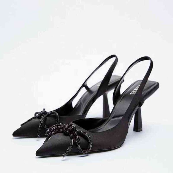 new spring women's black bright decoration pointed open heel shoes
new spring women's black bright decoration pointed open heel shoes