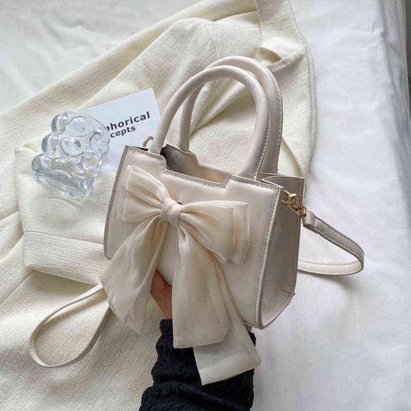 2022 new net red small square bag fashion trendy simple women's bag casual bow small square bag high-quality ladies messengerbag g22051
2022 new net red small square bag fashion trendy simple women's bag casual bow small square bag high-quality ladies messengerbag g22051