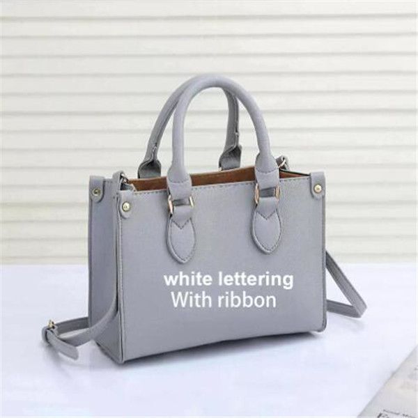 2022 handbag women luxurys designers bags 4-color casual travel ribbon tote bag pu material fashion shoulder bag's wallet 25cm
2022 handbag women luxurys designers bags 4-color casual travel ribbon tote bag pu material fashion shoulder bag's wallet 25cm