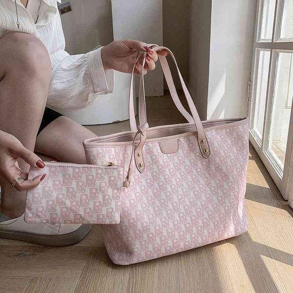 classic large capacity canvas women's letter new advanced sense handbag simple atmosphere fantote bag fashion handbags
classic large capacity canvas women's letter new advanced sense handbag simple atmosphere fantote bag fashion handbags