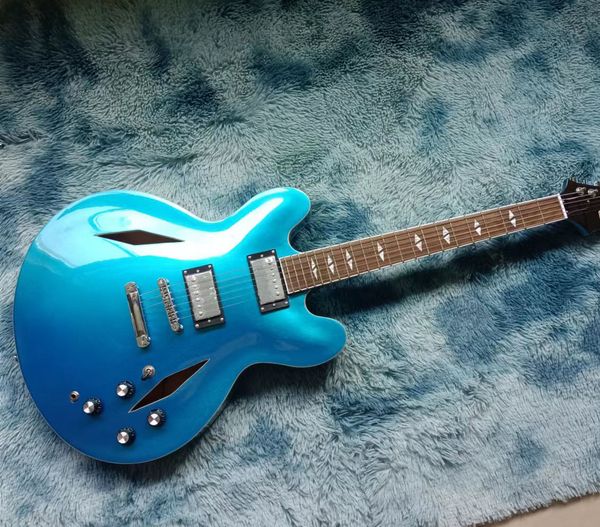 blue jazz electric guitar semi hollow body double hole delivery good quality 
blue jazz electric guitar semi hollow body double hole delivery good quality