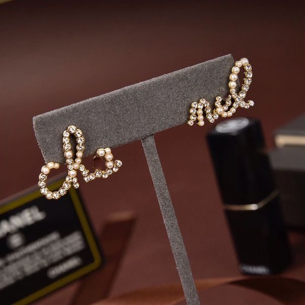 the factory directly c family small fragrance letter double pearl earrings new fragrant grandma earrings temperament net red high version, Golden
the factory directly c family small fragrance letter double pearl earrings new fragrant grandma earrings temperament net red high version, Golden