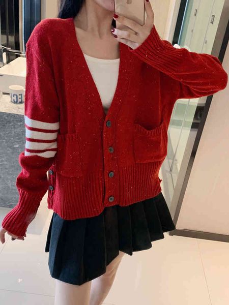 new year's red women's cardigan autumn and winter new foreign style loose v-neck college coat sweater, White
new year's red women's cardigan autumn and winter new foreign style loose v-neck college coat sweater, White