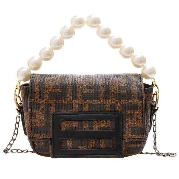 70% factory online sale children's autumn and winter pearl hand style little girl bag girl show accessory bag
70% factory online sale children's autumn and winter pearl hand style little girl bag girl show accessory bag