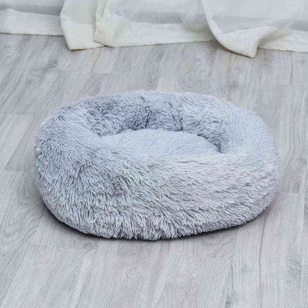 plush dog kennel winter round cat kennel cushion four seasons pet products 
plush dog kennel winter round cat kennel cushion four seasons pet products