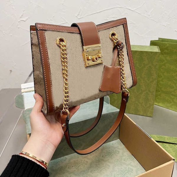 2022 designer tote women shoulder bags padlock with chain square lock canvas genuine leather bow stripes distressed fashion handbag
2022 designer tote women shoulder bags padlock with chain square lock canvas genuine leather bow stripes distressed fashion handbag