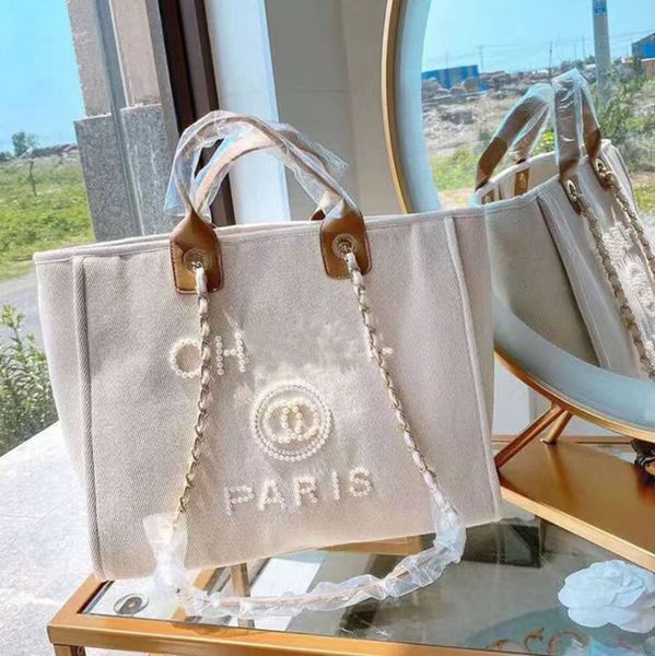 classic luxury brand beach bags canvas pearl evening bag designer portable shopping large capacity handbag women handbags label backpack lad
classic luxury brand beach bags canvas pearl evening bag designer portable shopping large capacity handbag women handbags label backpack lad