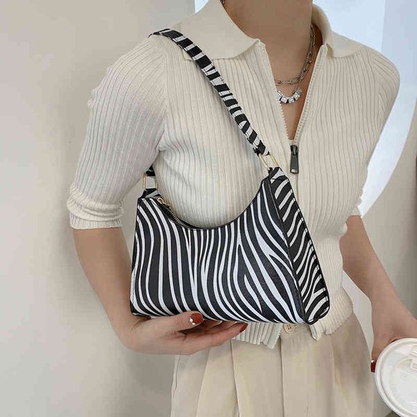 the new designer handbags fashion dign women's tipping soft pu leather lady underwritten shoulder bag retro simple girl clutch wallet t
the new designer handbags fashion dign women's tipping soft pu leather lady underwritten shoulder bag retro simple girl clutch wallet t