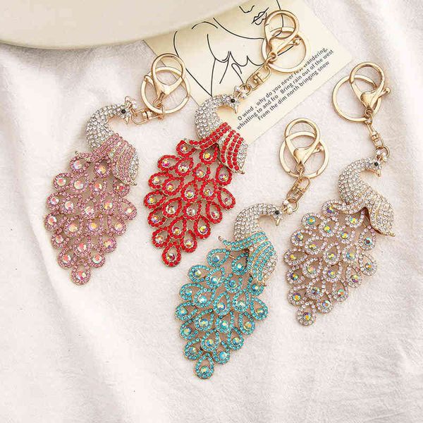 creative alloy pendant peacock metal key chain auto parts diamond inlaid small gift pendant, Silver
creative alloy pendant peacock metal key chain auto parts diamond inlaid small gift pendant, Silver