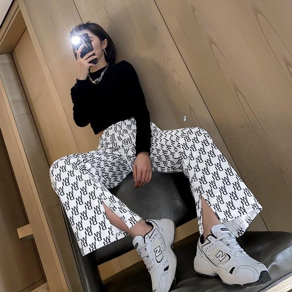 spring wide leg pants for women letters printed loose split buttons elastic waist thin trousers female sport wear 2358, Black;white
spring wide leg pants for women letters printed loose split buttons elastic waist thin trousers female sport wear 2358, Black;white